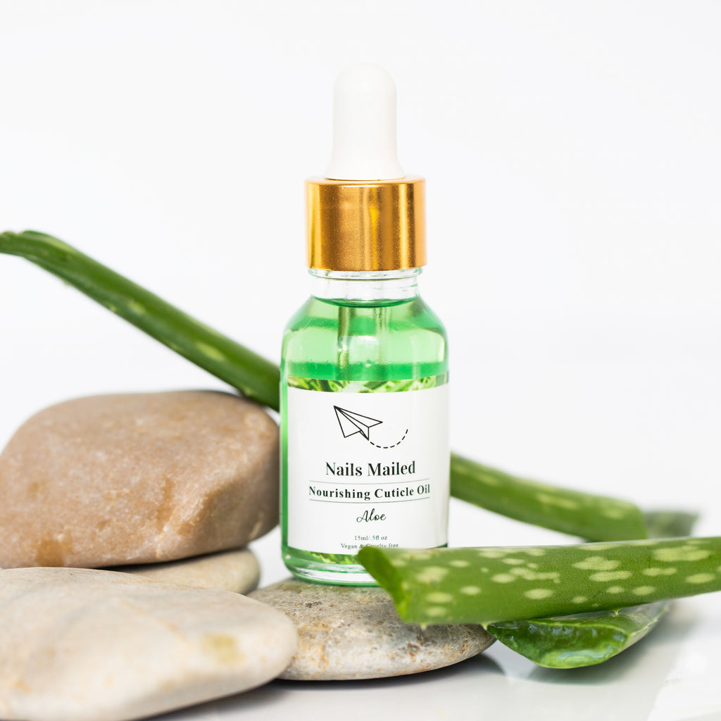 Aloe Scented Jojoba Oil Cuticle Oil - a luxurious and moisturizing oil made with high-quality jojoba oil and aloe vera extract, showcased against a white background.