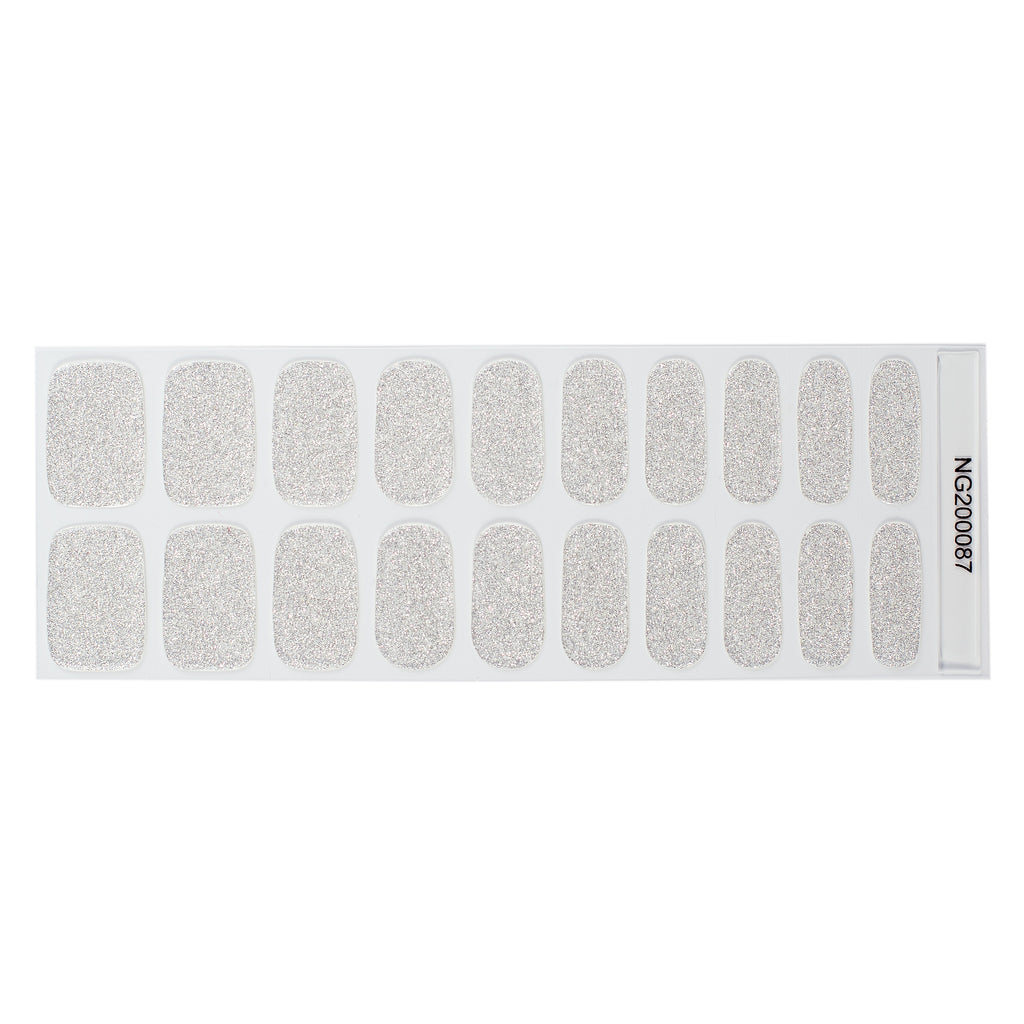 An image showcasing Nails Mailed's "Wedding Lace" Gel Nail Wraps, a dazzling display of white glitter wraps that evoke the intricate elegance of wedding lace. The wraps promise both a radiant aesthetic and defense against nail damage.