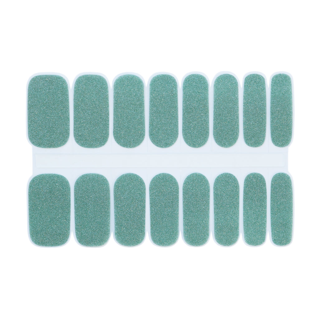 Atlantis Awe FlexiGel nail wrap showcasing its ocean teal glitter. FlexiGel technology offers durability and a snug fit, displayed against a clean white background.
