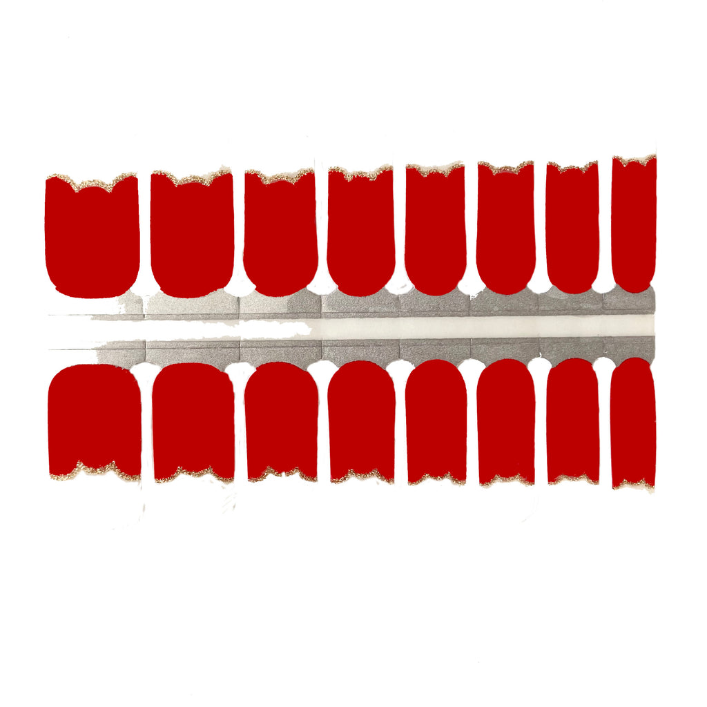 A close up of red French tip nail wraps on a white background. The wraps feature a bold and classic shade of red and are made of high-quality materials. The wraps are easy to apply and remove, making them a convenient manicure.