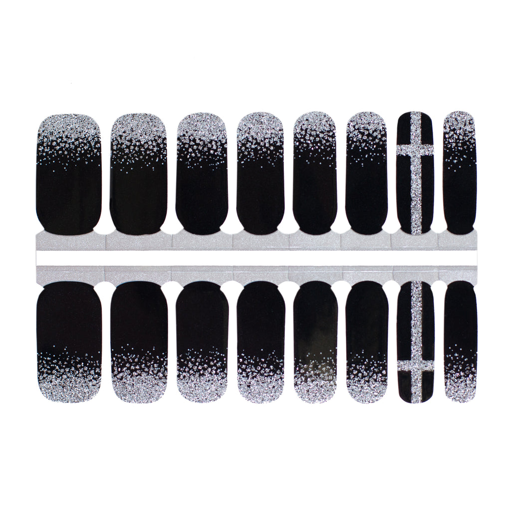 Close-up of Frosted Black nail wraps showcasing deep black color, shimmering silver accents near the cuticle, and intricate geometric design on one nail – perfect for Halloween elegance