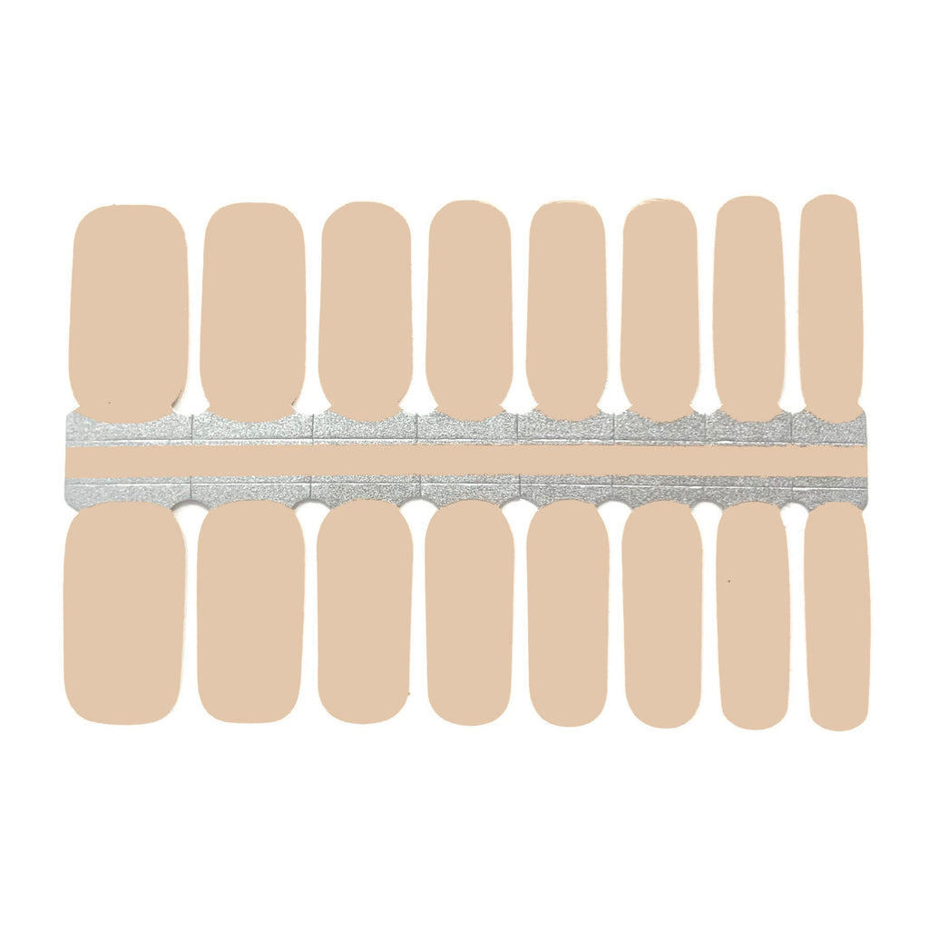 Image of Nude nail wraps by Nails Mailed, featuring a classic light tan color against a clean white background. These elegant nail wraps offer a universal shade that complements any skin tone, providing a sophisticated and natural look for DIY salon-quality nails at home.