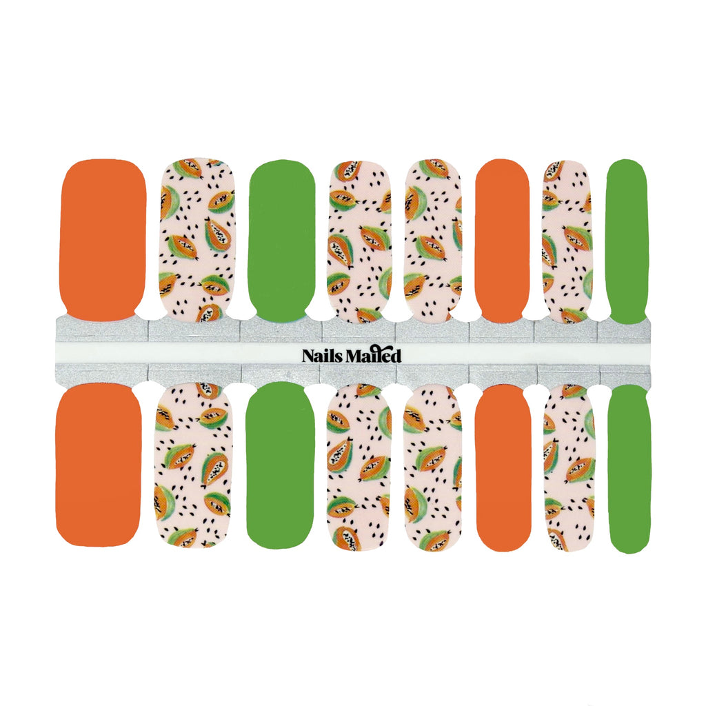 These bright and colorful summer nail wraps are shown in a close-up photograph. The wraps are arranged neatly on a white background, highlighting their fun designs and vibrant colors. The green and orange base of the wraps features playful polka dots and tropical papayas, adding a touch of summer flair to any outfit.