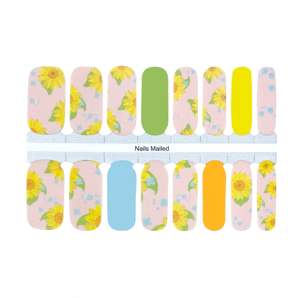 Simple Sunflower Nail Wraps - a charming and whimsical set of nail wraps featuring sunflower graphics on a soft pink, yellow, and green base, showcased against a white background
