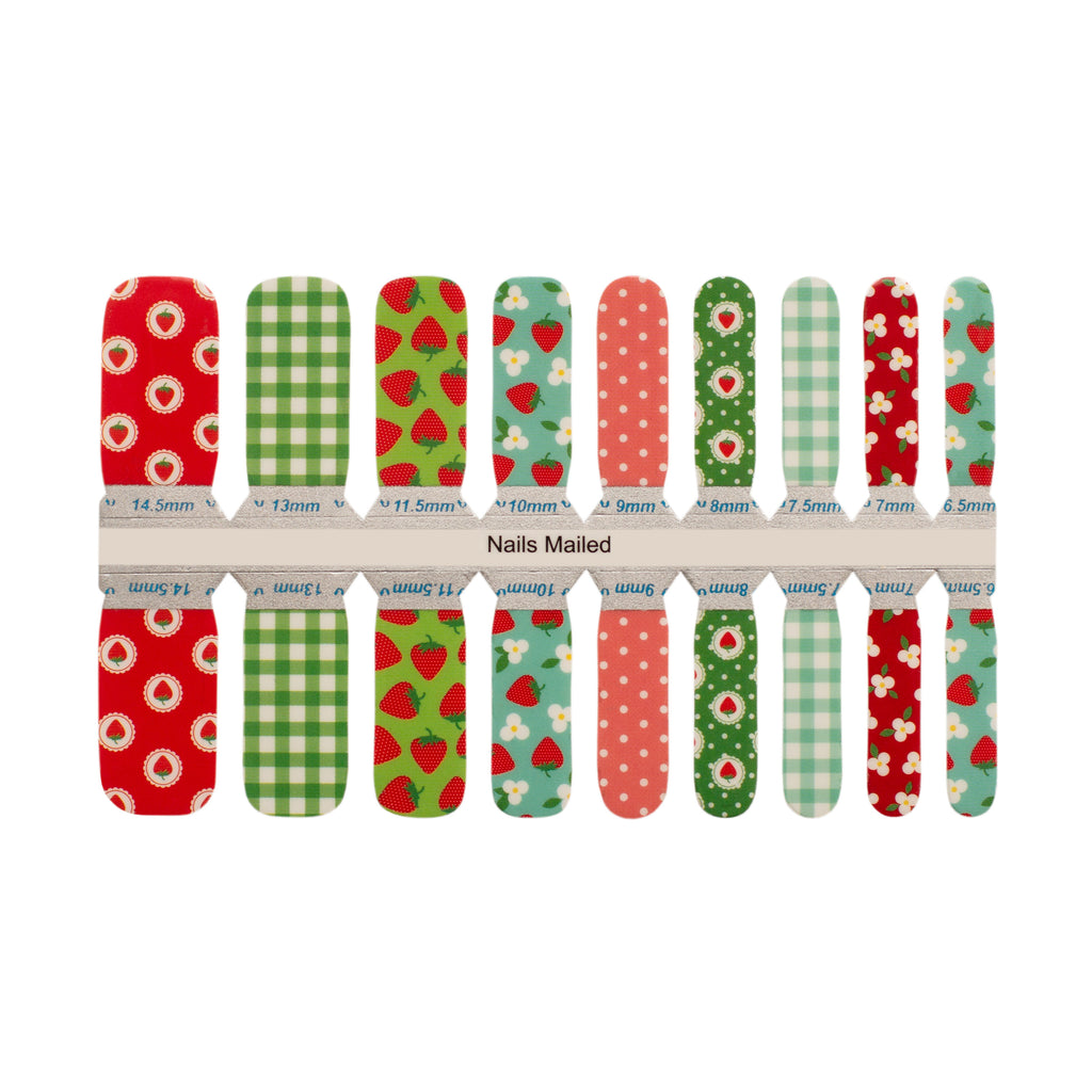 Super Sweet nail wraps against a white background, featuring adorable strawberries, classic gingham pattern in vibrant red, accented by refreshing greens and light blues for a playful and exclusive kids' nail art design.