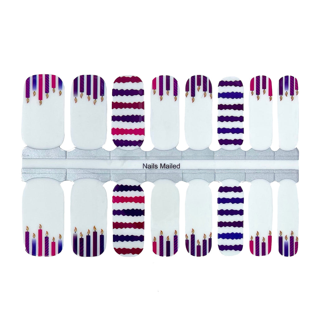 a sheet of birthday candle nail wraps on a white background, perfect for adding a festive touch to your nails - by Nails Mailed